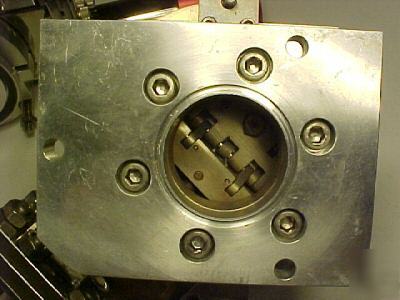Front/back laser mirror mount / vacuum valve assemblies