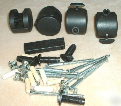 Set of 4 black plastic casters or rollers for cabinet