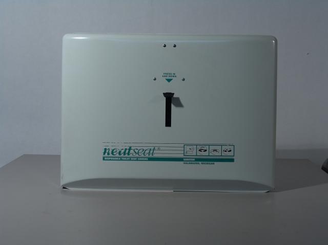 Neat seat toilet seat cover dispenser 
