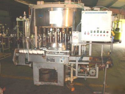 Us bottler 36 head vacuum liquid filler